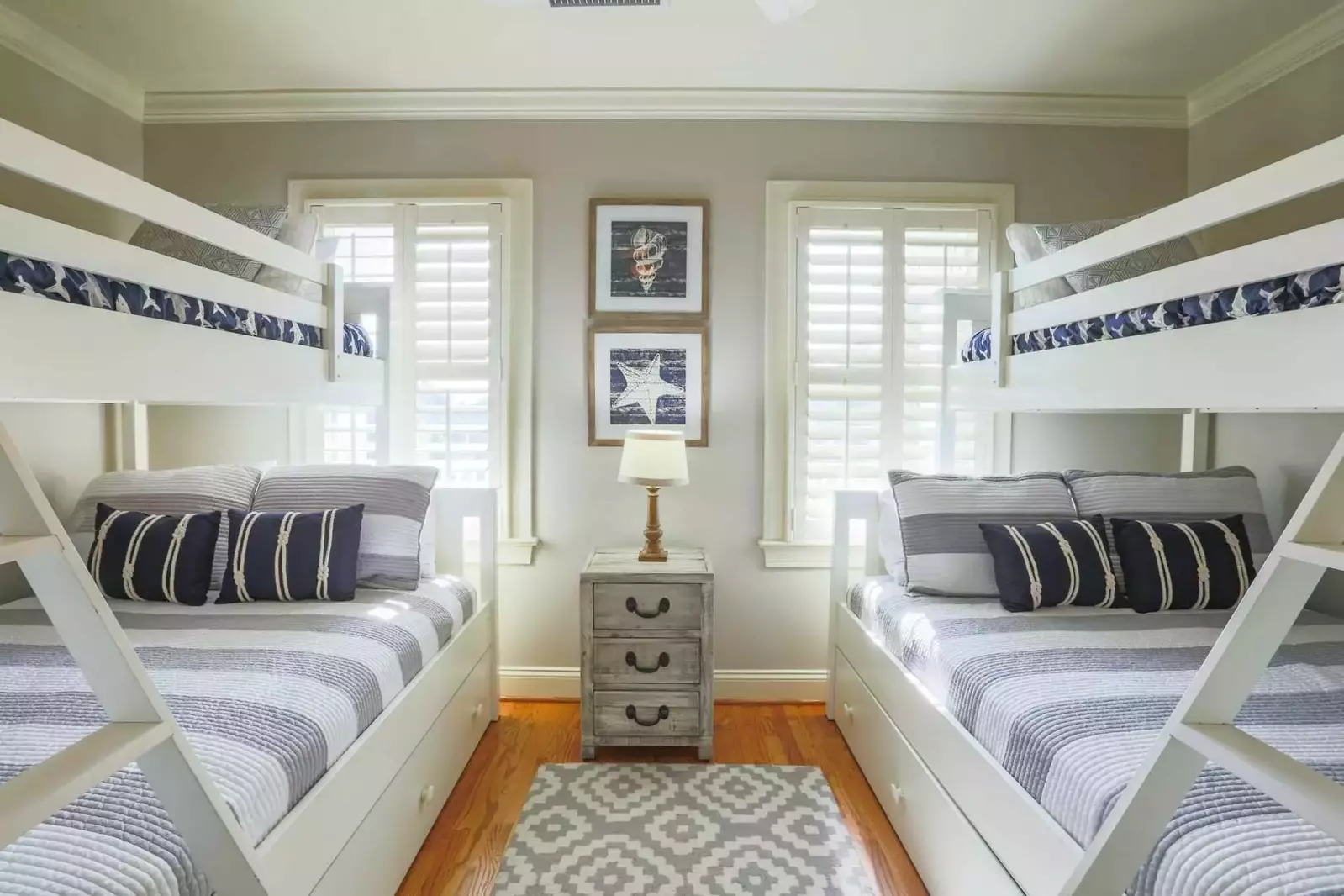 Both bunk beds have a full size bed on the lower bunk and a tiwn size bed on the upper bunk.