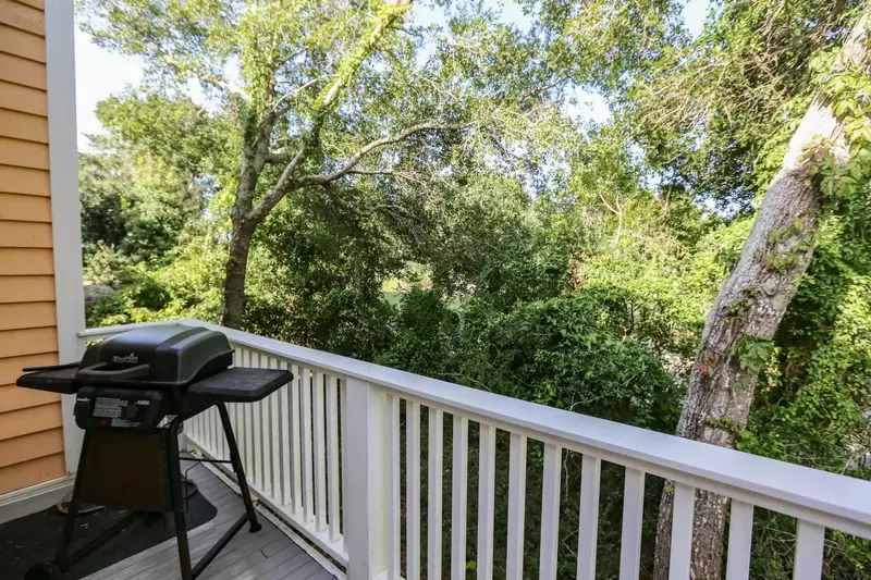 There is a small propane BBQ grill on the back porch off of the kitchen.