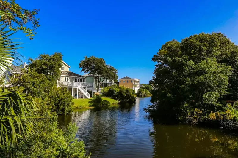 The Pelican Bay community features lovely lagoons & waterways.