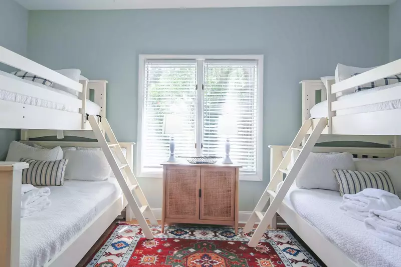 Your kids will love spending time together in this bunk bedroom.
