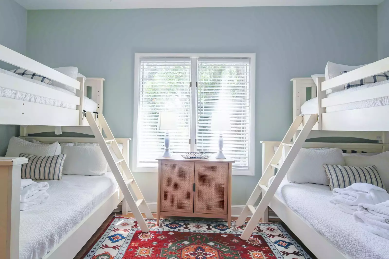 Your kids will love spending time together in this bunk bedroom.