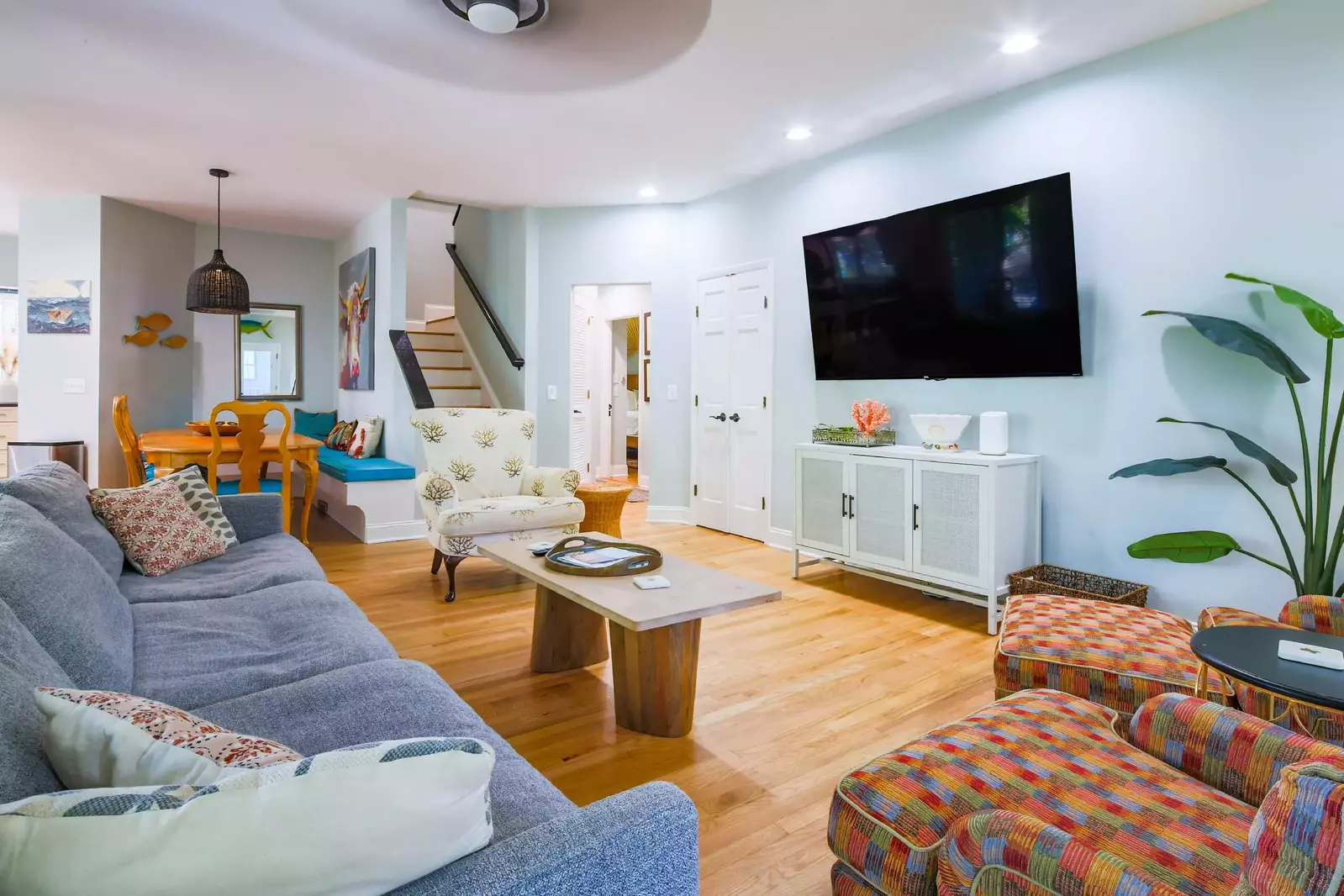 The living room flows into the dining area and kitchen.