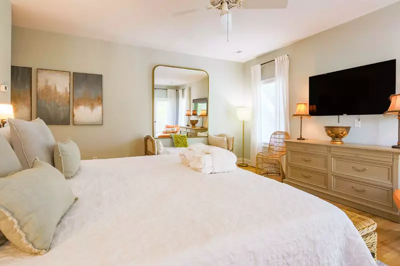 The primary suite expands through the entire second floor of the home.
