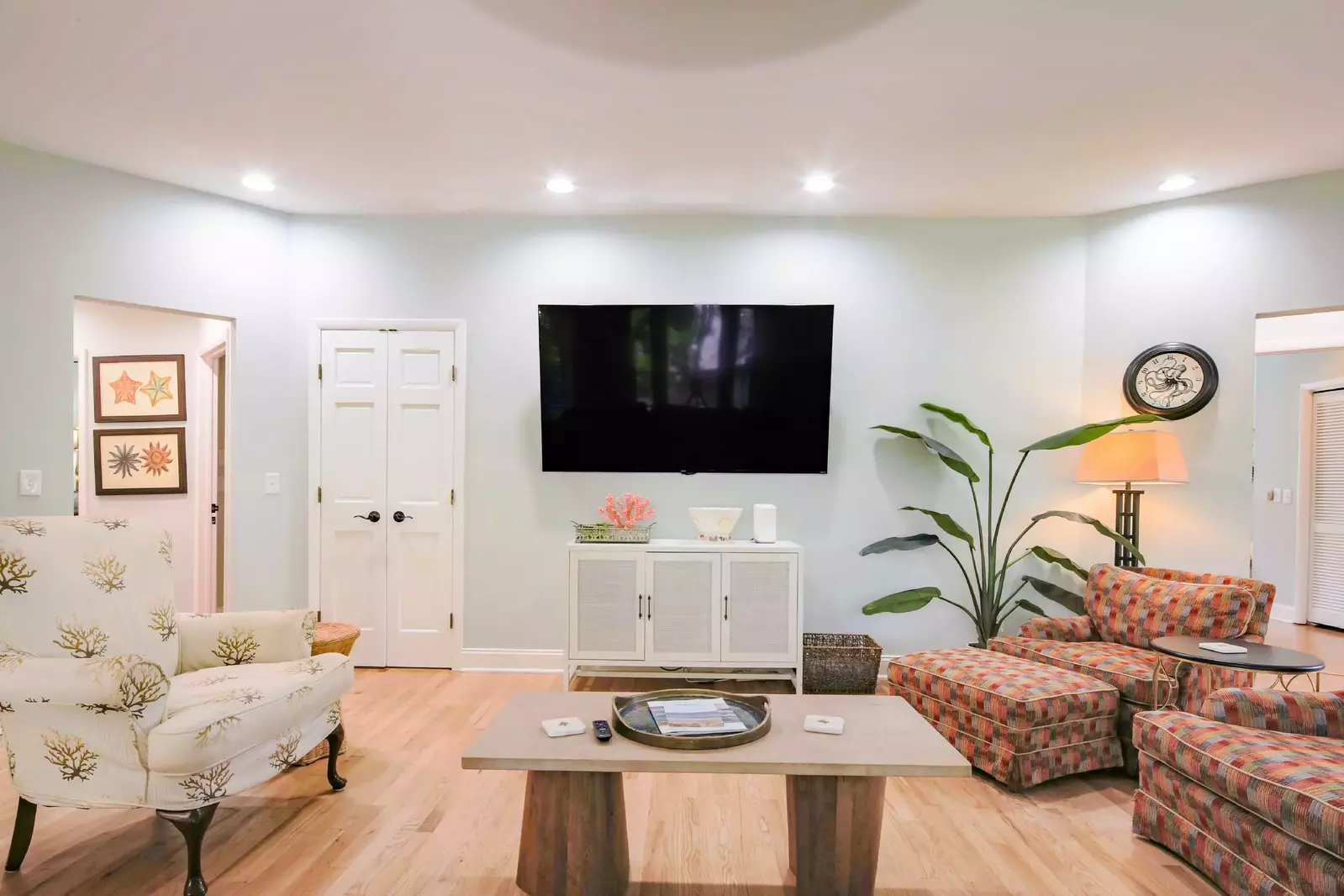 The three guest bedrooms are all accessible through the living room on the lower level.