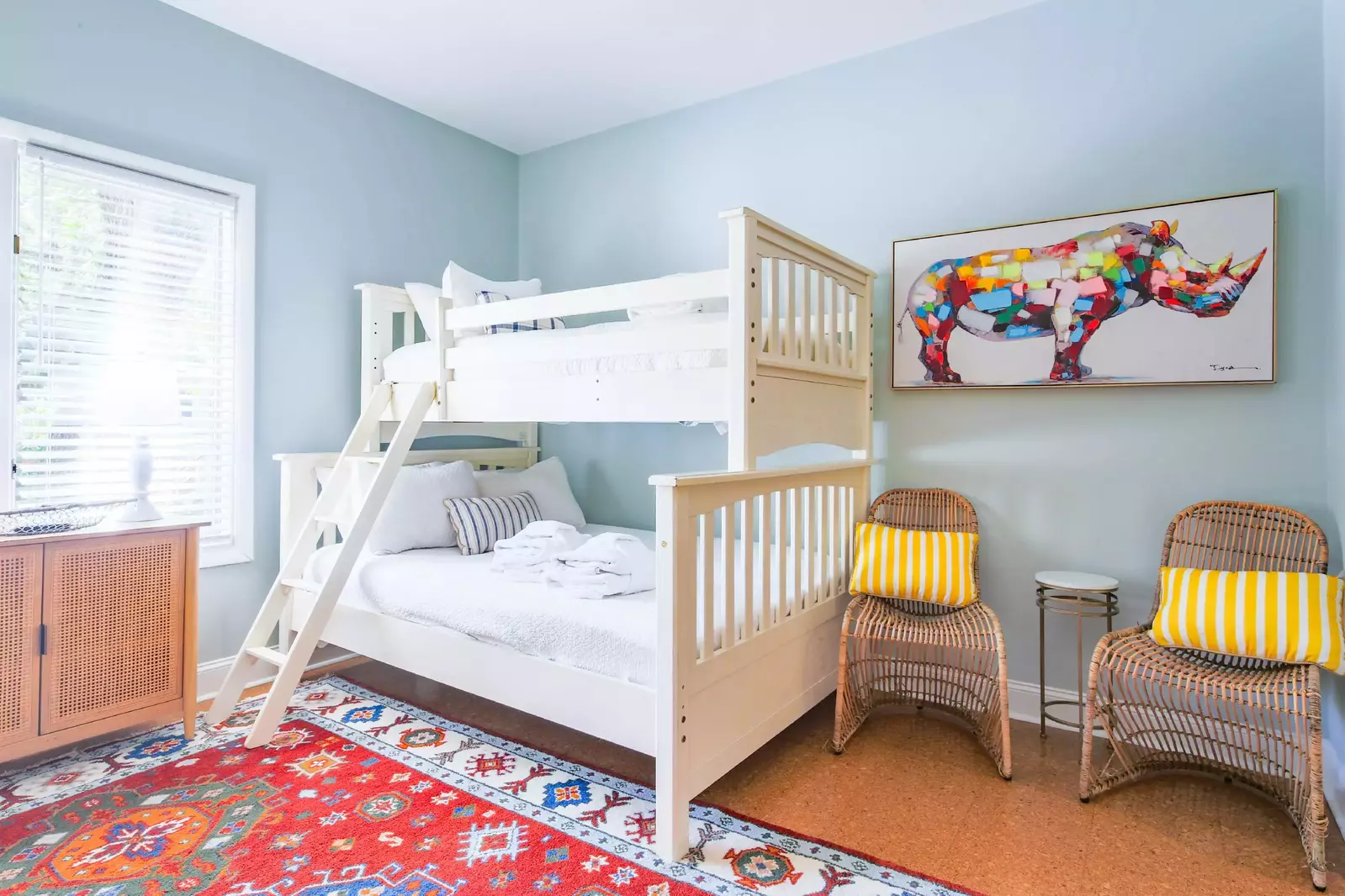 Both of the bunk beds have a full bed on the bottom and a twin bed on the top bunk.