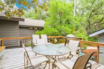 This home is tucked away within Kiawah Island's serene maritime forest.