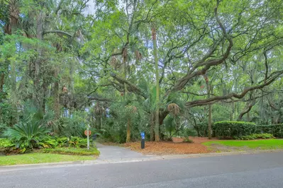 Oceanwoods Cottage is located immediately across the street from Kiawah's boardwalk 15 to the beach.