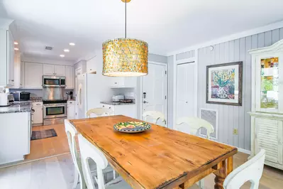 When you enter the front door, you'll find this dining area and kitchen.