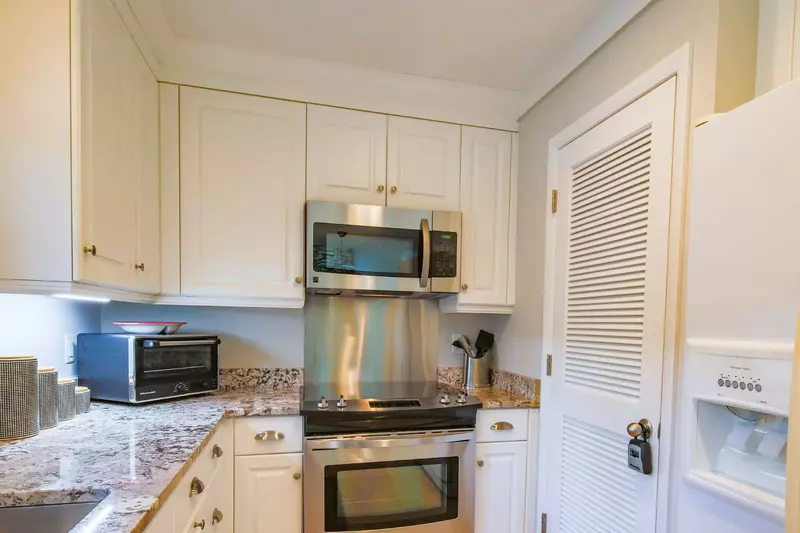 There is also a refrigerator and dishwasher.