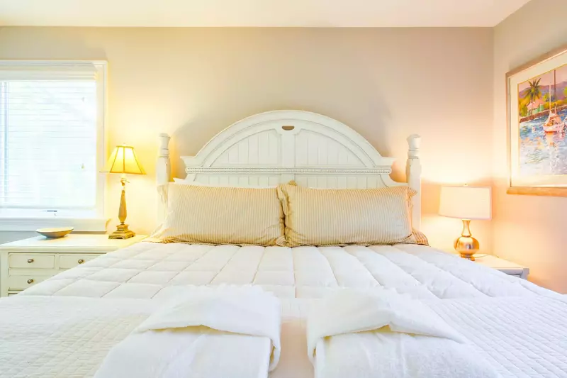 The master suite is located off of the living room.