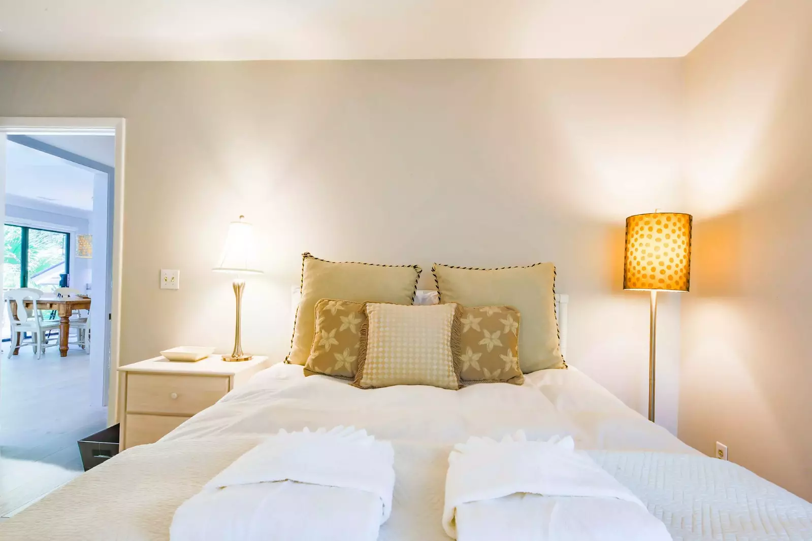 This guest bedroom is located off of the living room and dining area.