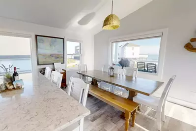 The dining table comfortably seats 6 people.
