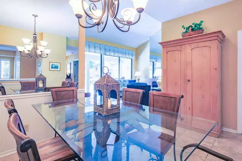 The dining table comfortably seats 6 people and there is an additional dining table on the back deck.