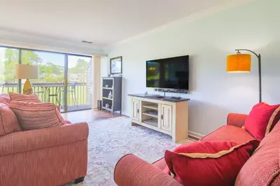 Golf, Sea & Sunshine is an Inverness Village end unit villa with golf course views & lovely sunlight.