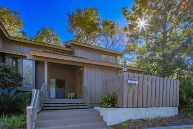 Follow these steps to access the front door of this comfortable villa.