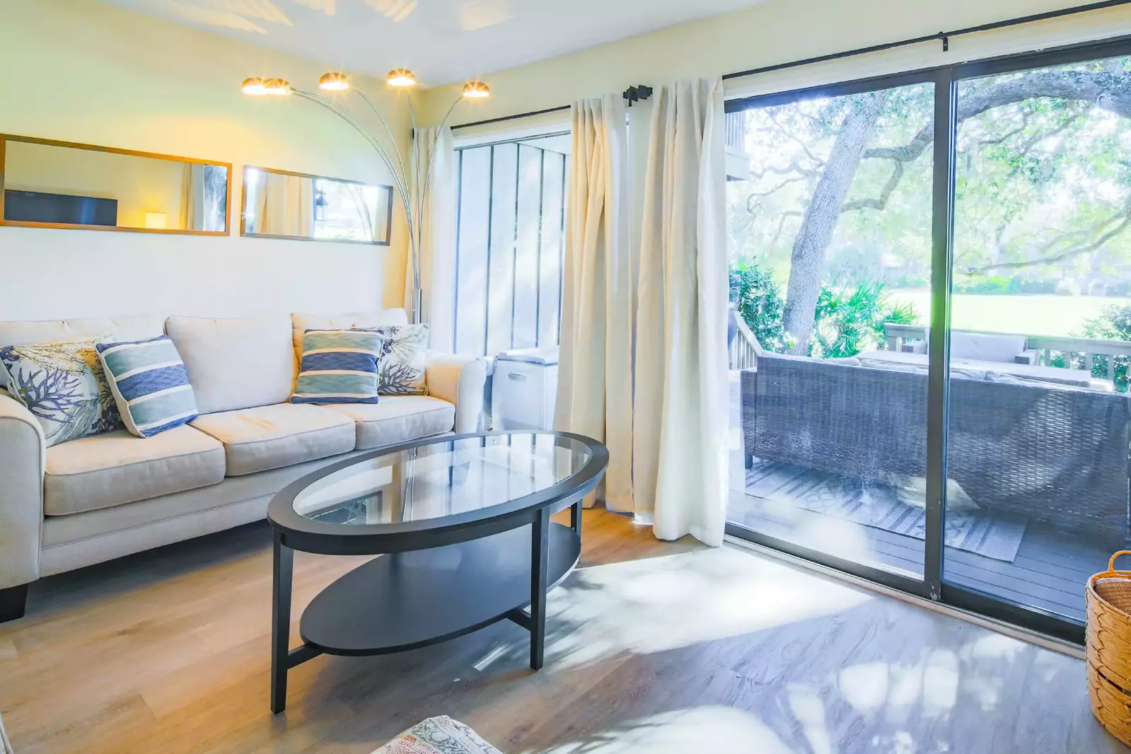 The sliding door in the living room leads to the back deck.