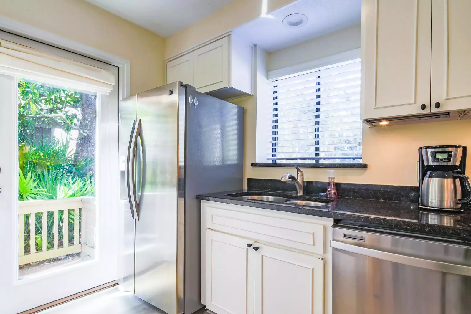 This door in the kitchen leads to the side deck.