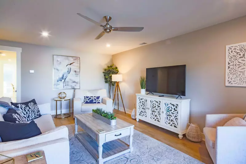 There's plenty of room in the living room for your family to gather together.