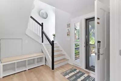 When you enter the front door, you'll find this entryway and staircase to the second floor.