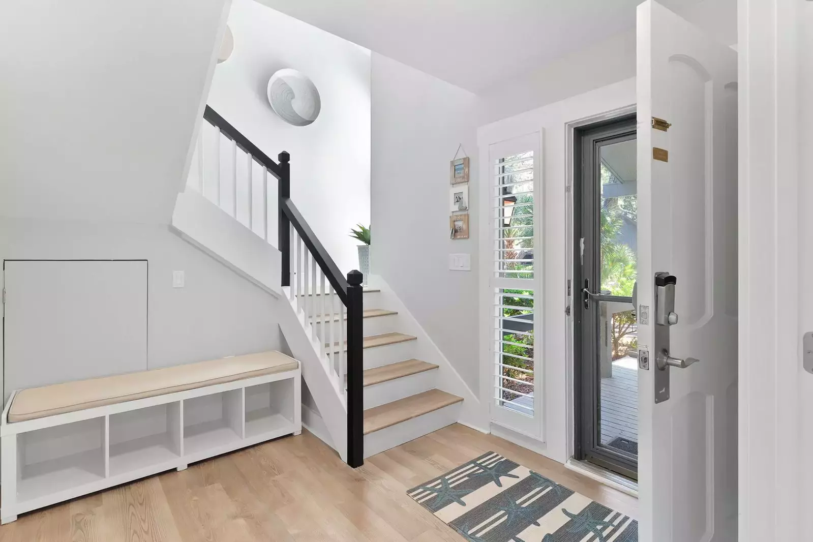 When you enter the front door, you'll find this entryway and staircase to the second floor.