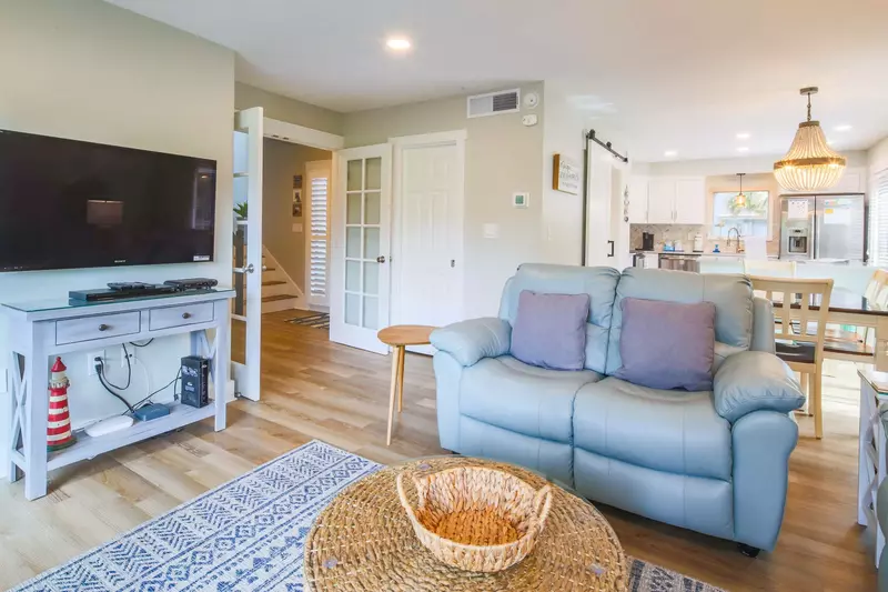 From the entryway, you can access the living room, dining area and kitchen.