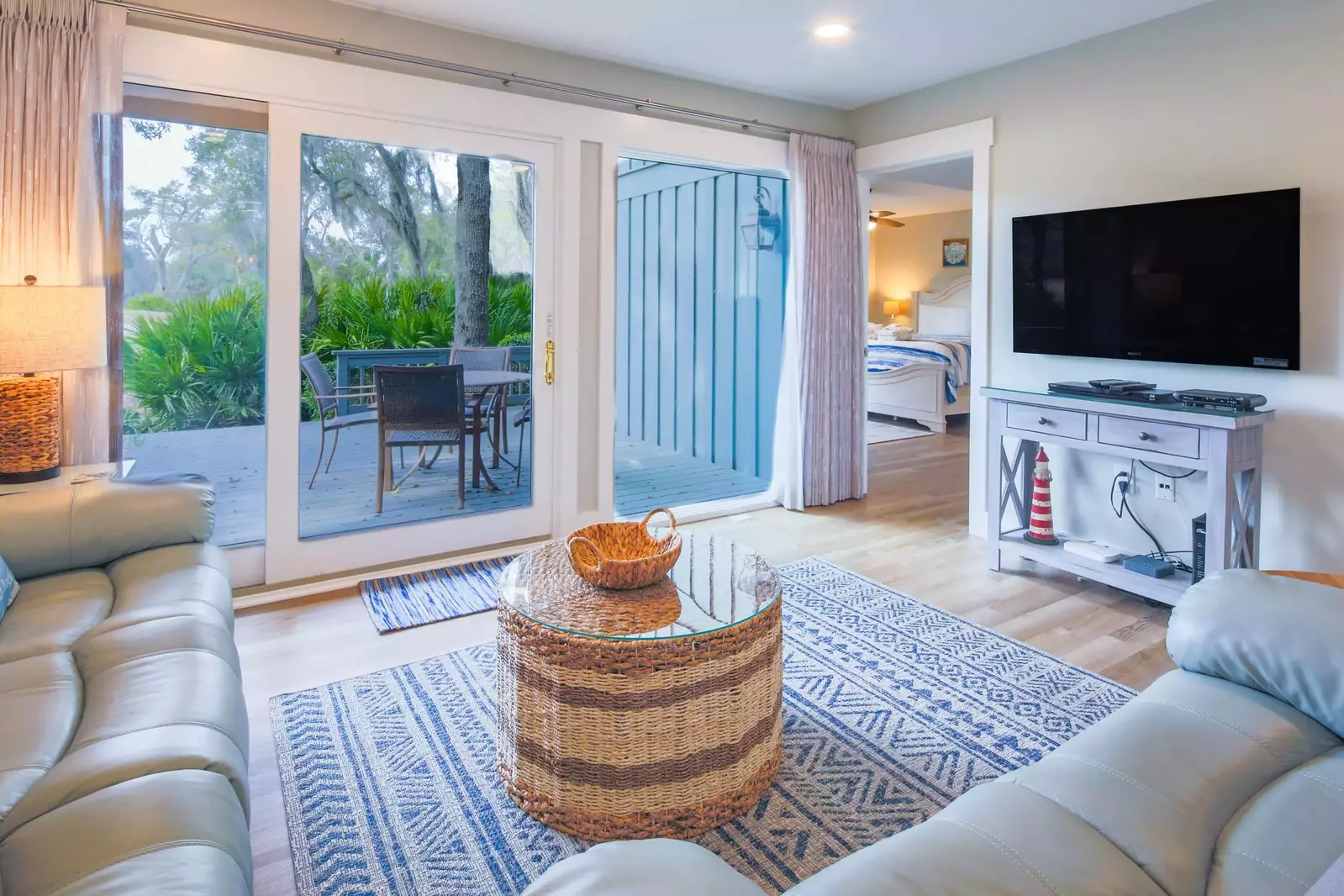 The living room receives lovely natural light through its nearly wall-to-wall set of windows.