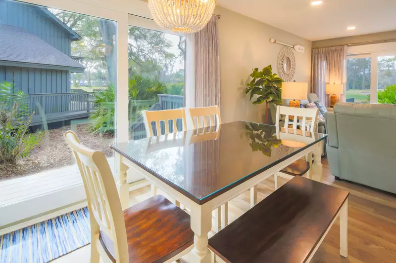 The dining table seats 6.  There are also 3 stools at the kitchen counter and an outdoor table that seats 4.