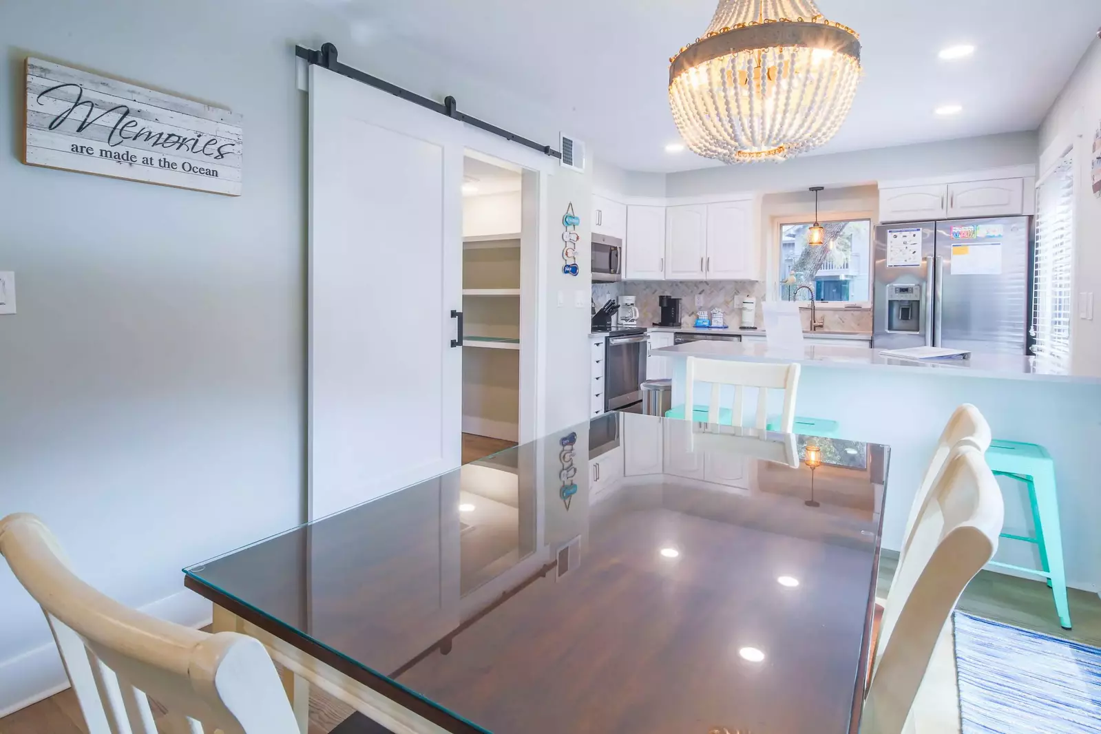 The dining area flows into the beautifully renovated kitchen.