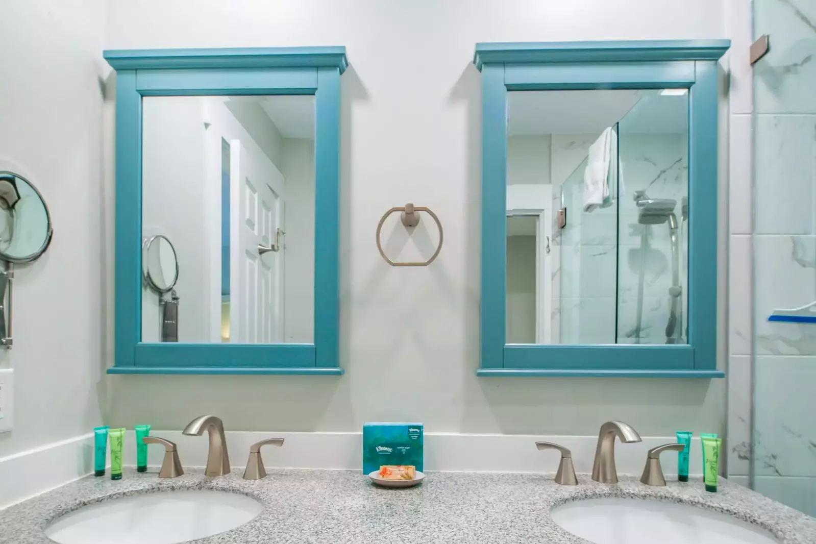 The spacious vanity has two sinks and two mirrors.