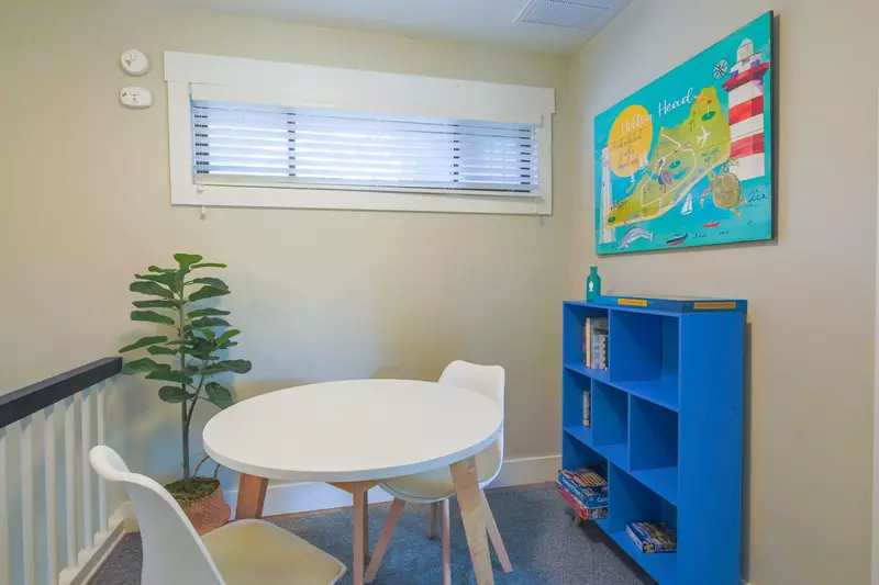 This game table is located at the top of the stairs outside the two guest suites.