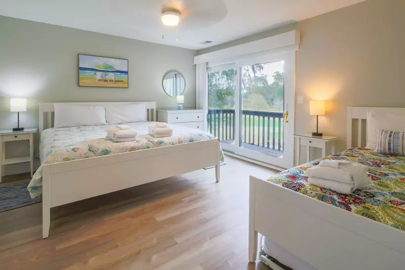 The king suite has sliding door access to an outdoor balcony.