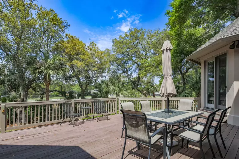 You can access the back deck through the dining area and the master suite.