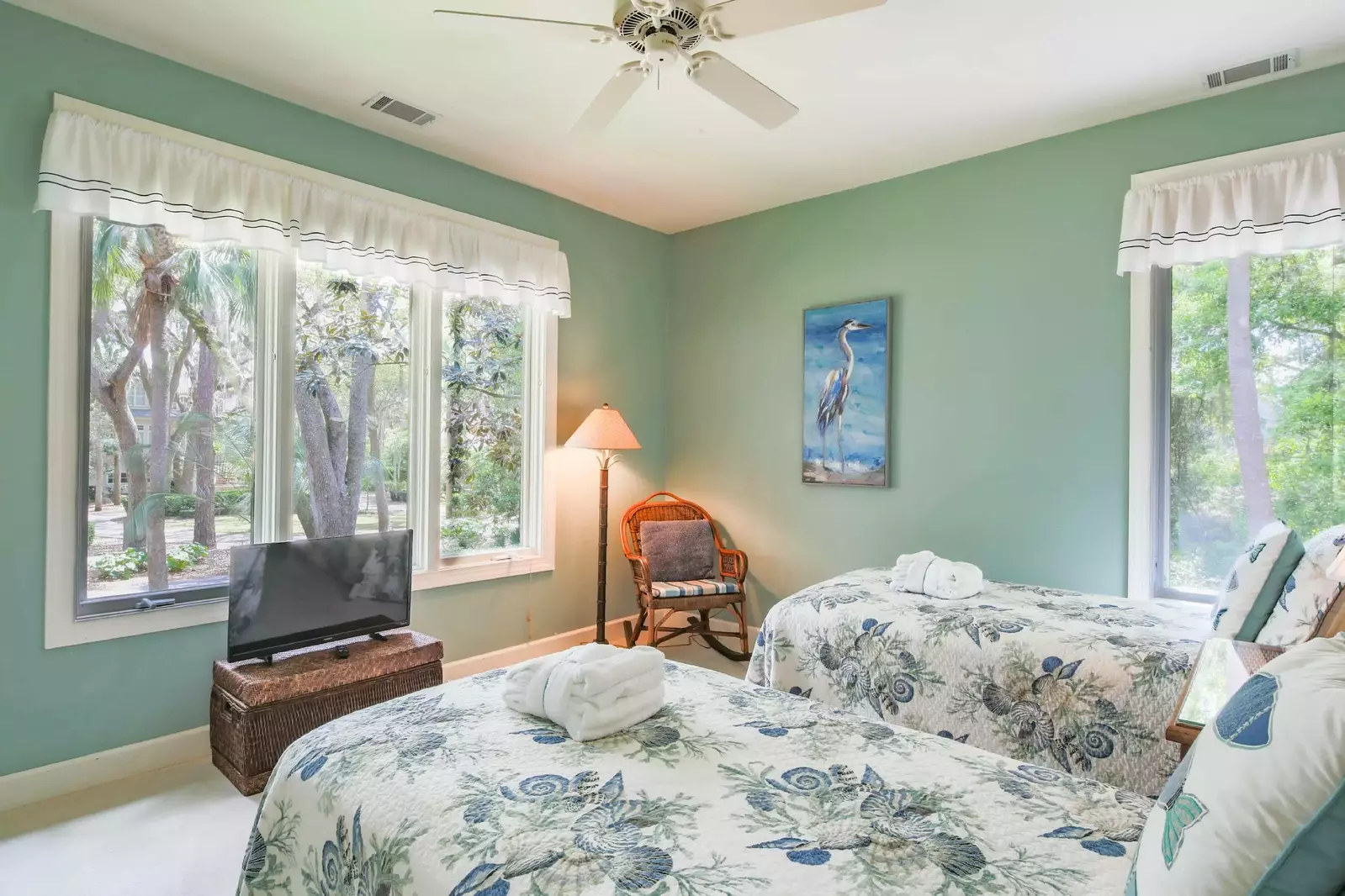 The twin suite has a rocking chair, flat screen TV, wonderful natural light and a ceiling fan.