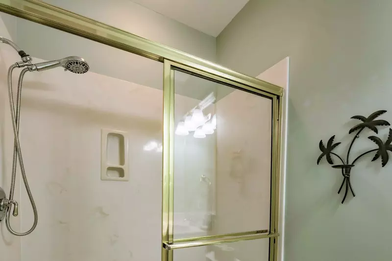 The twin en suite bathroom also has a walk-in shower.