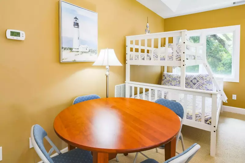 The bonus room also has a twin over full bunk bed and a game table.