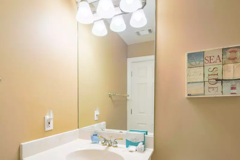 This bathroom in the bonus room has a spacious vanity.