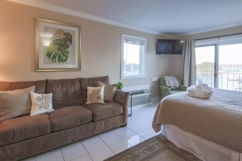 Ketch Studio also features a sofa, arm chair and two TVs.