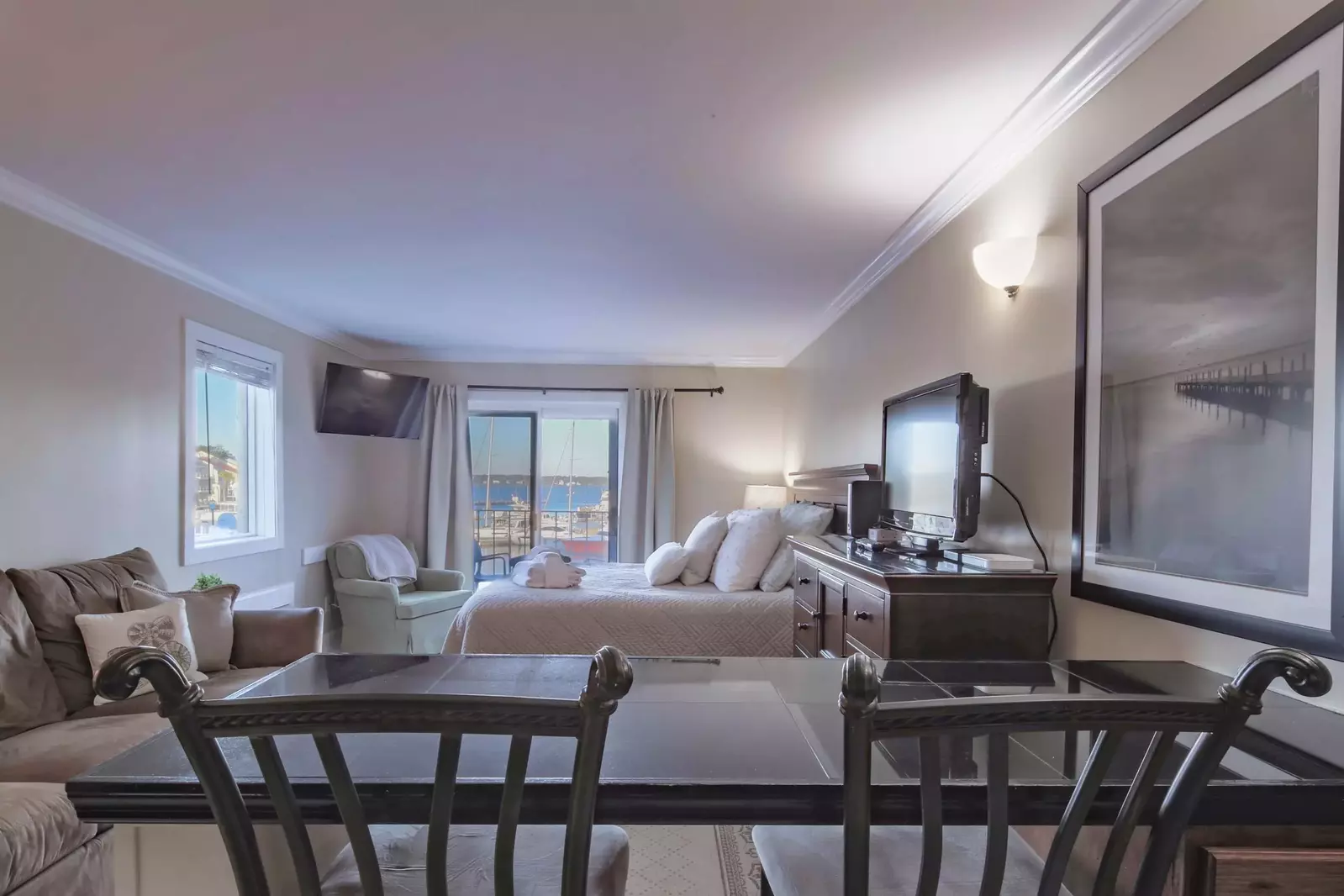 Ketch Studio is one large room with the kitchenette, high top counter, king bed and seating area.
