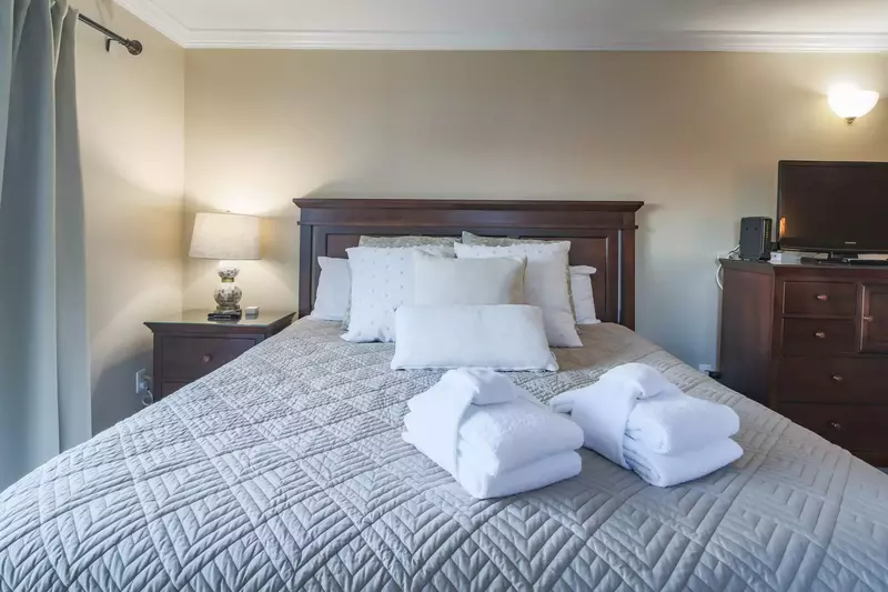 The bed will be made in advance of your arrival with freshly laundered sheets.