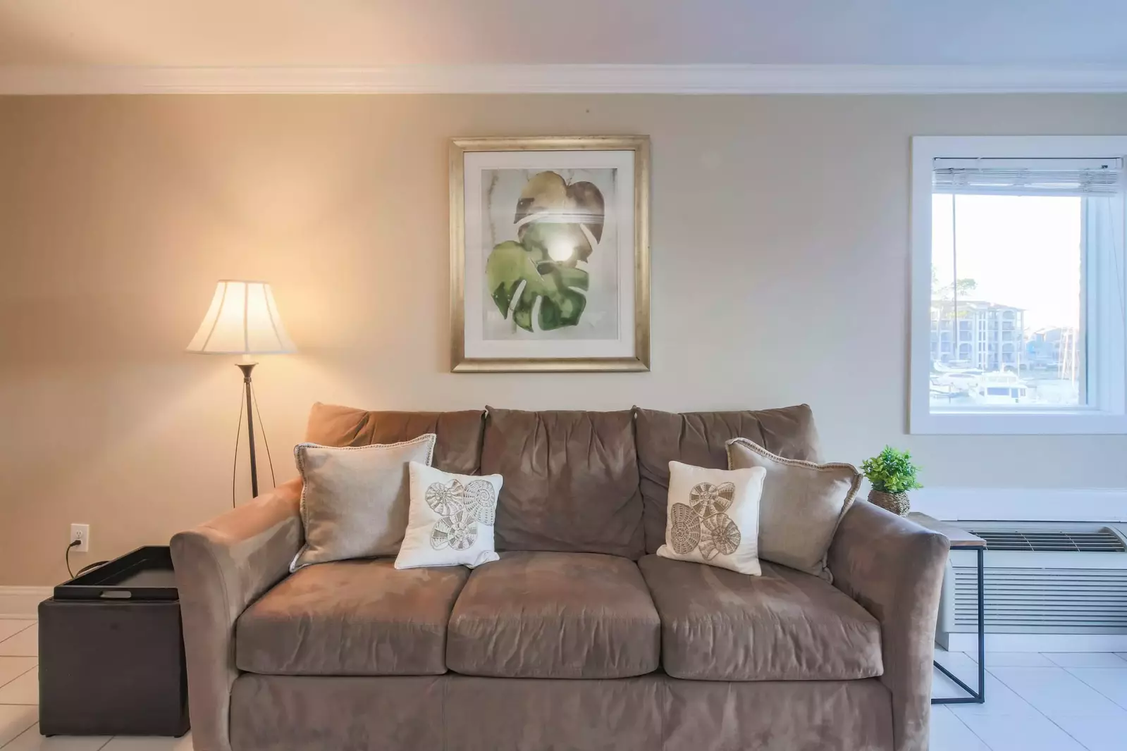 Ketch Studio receives lovely natural light through the window and sliding glass doors.