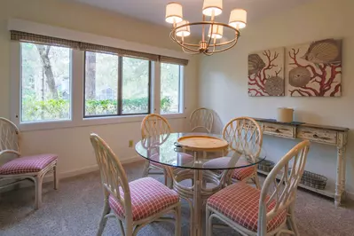 The dining table can seat up to 6 people.