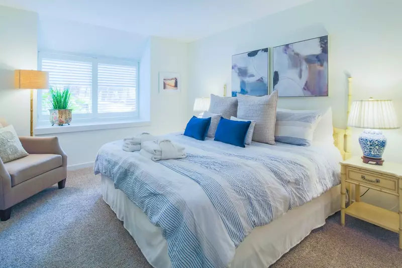 This comfortable master suite awaits you.