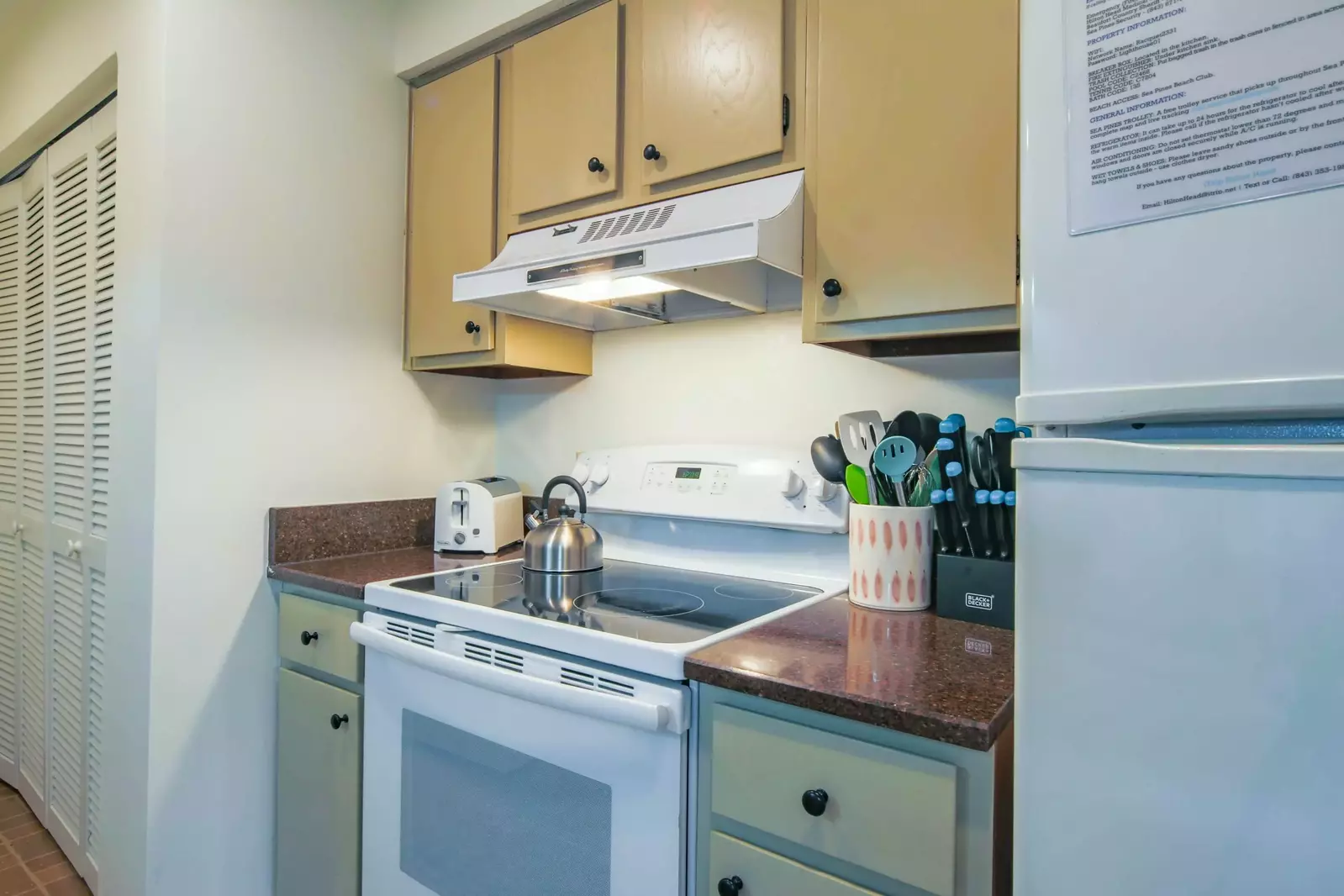 There is also a range, refrigerator and toaster in the kitchen.