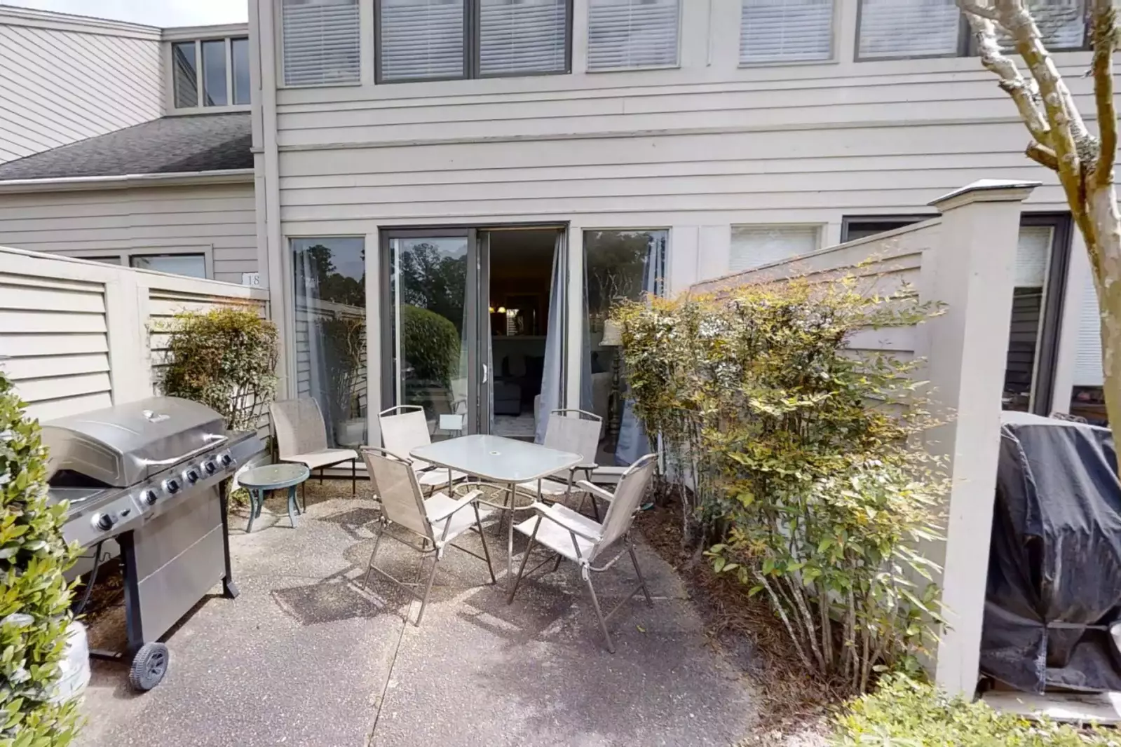 Patio off of the Family Room - Gas Grill and Seating for 4 at the table