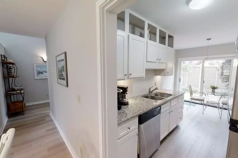 Kitchen with Keurig and drip coffee makers and dinette for 2.