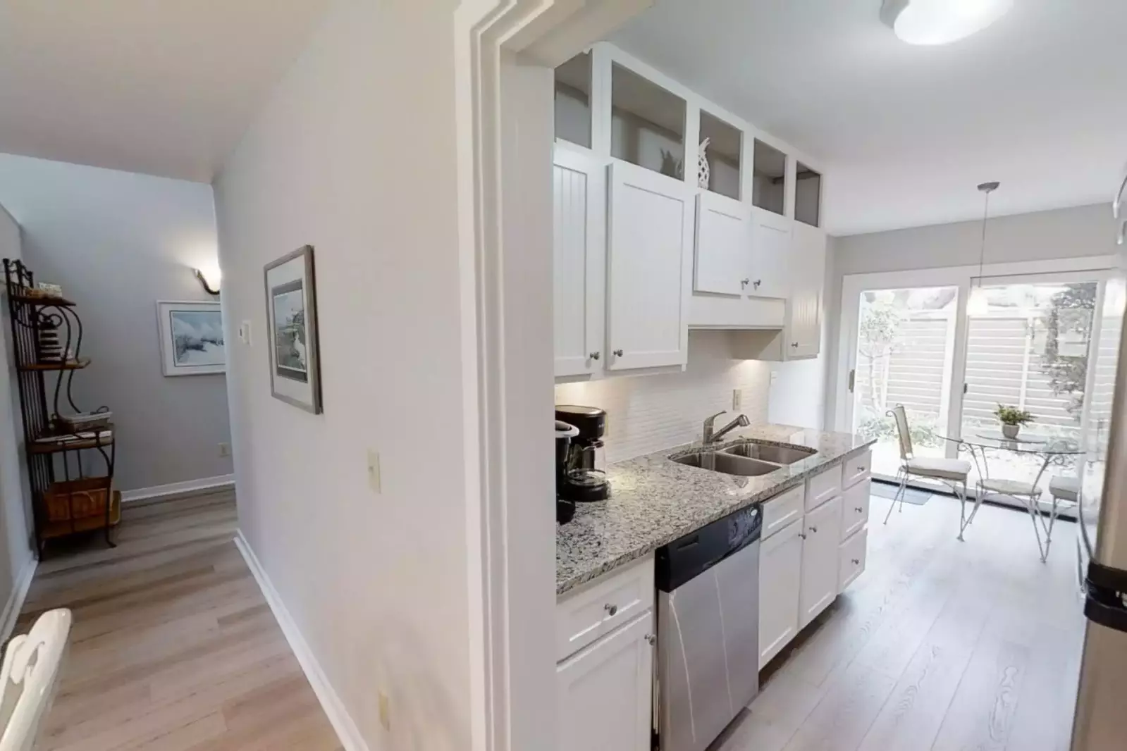 Kitchen with Keurig and drip coffee makers and dinette for 2.