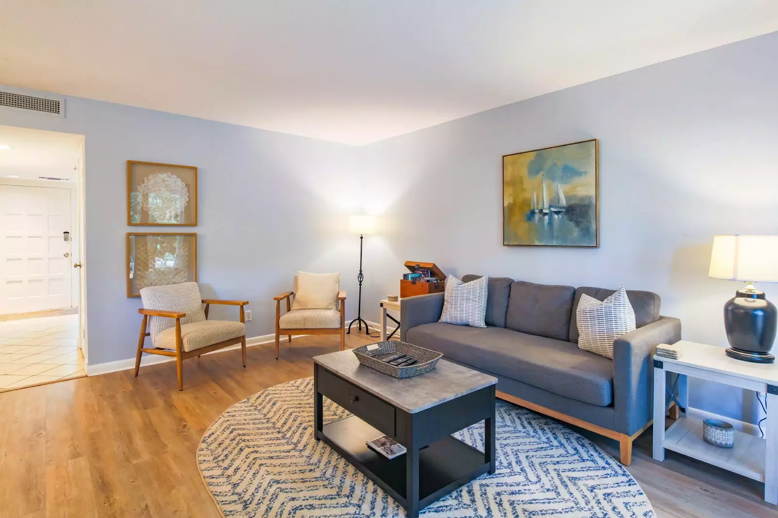 When you enter the home, you'll find this comfortable living room.