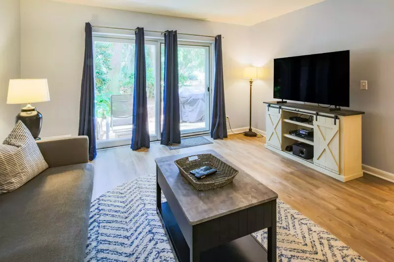 These sliding glass doors take you from the living room to the back patio.