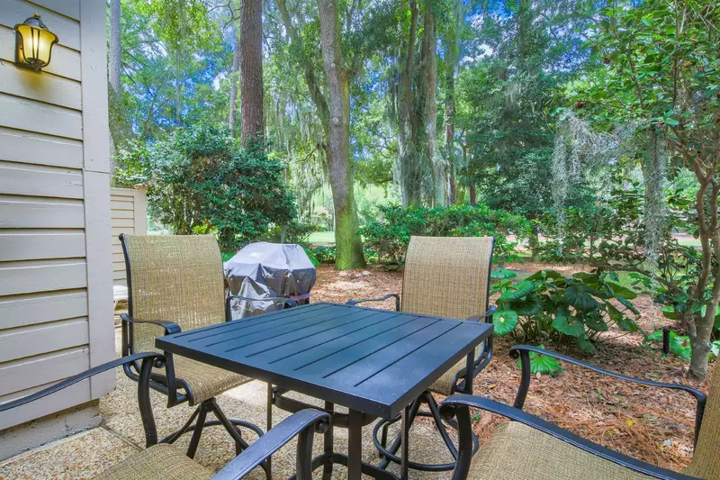 There's also a high top dining table and a gas BBQ grill on the back patio.