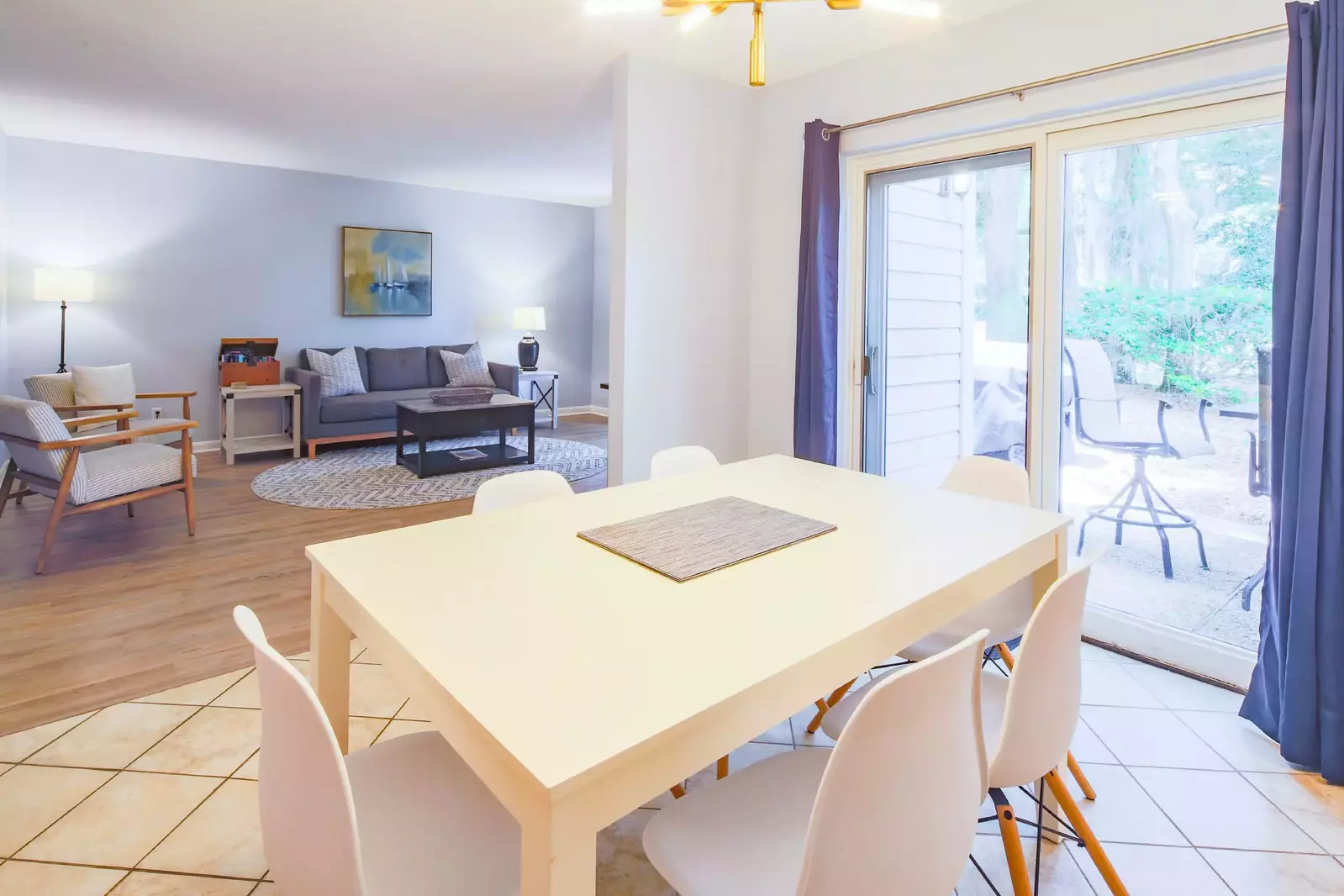 The living room flows into the dining room.